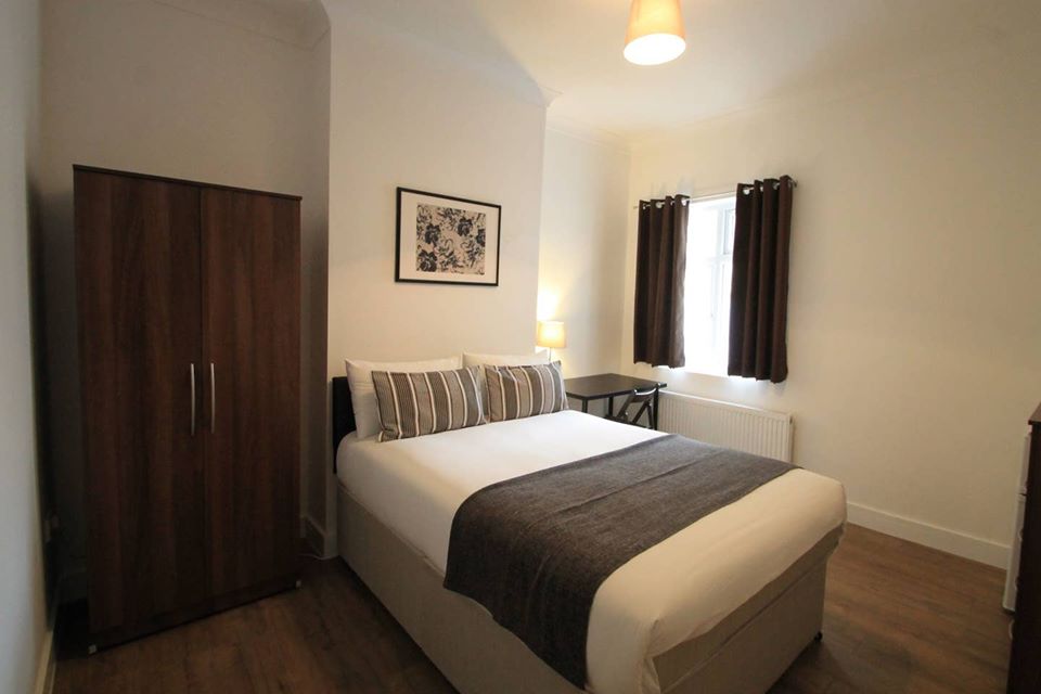 A bright, furnished bedroom